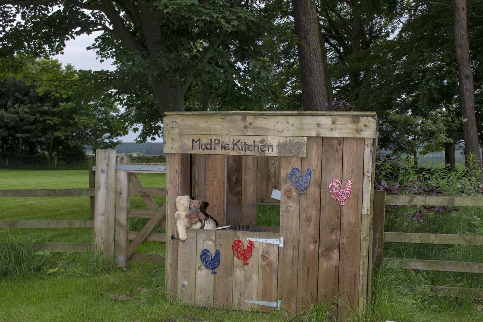 Childrens outdoor play area with mud pie kitchen