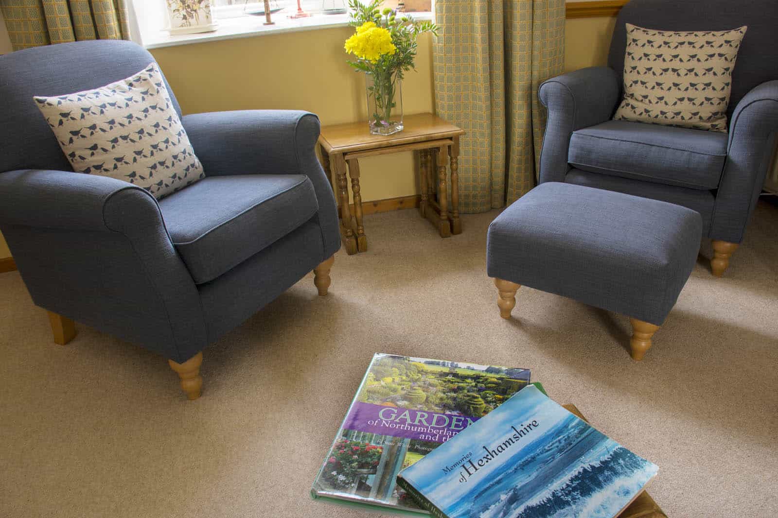 Comfortable sitting room and tourist information for guests